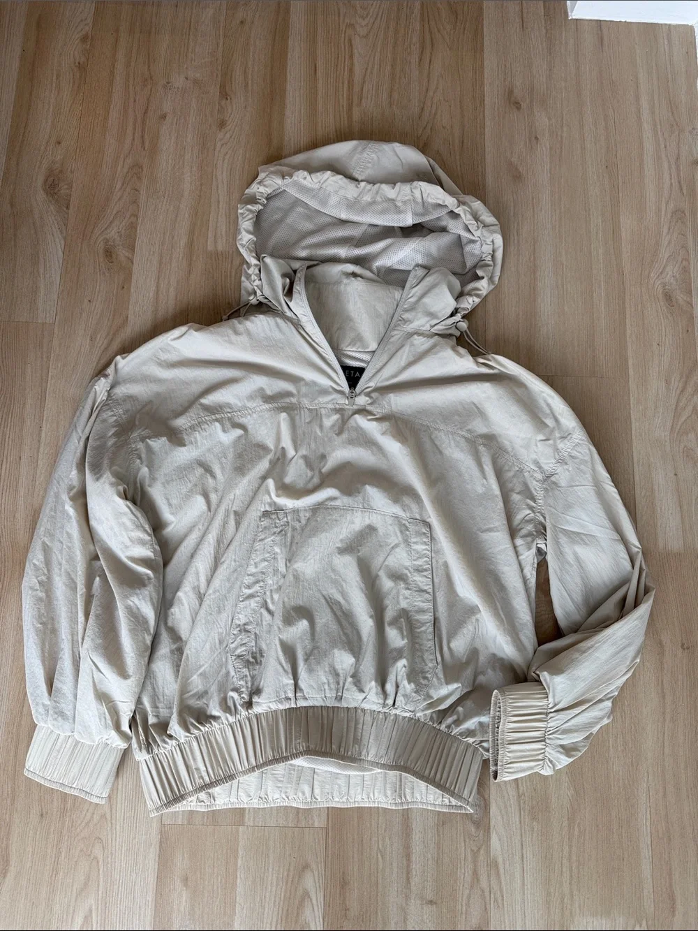 Athleta Cream Half-Zip Lightweight Pullover with convertible hood